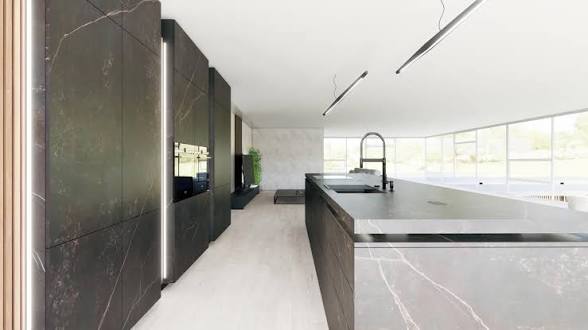 Cuisine noire avec îlot central et plan de travail en pierre